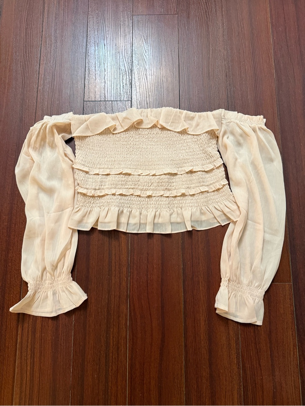 cream ruffle top